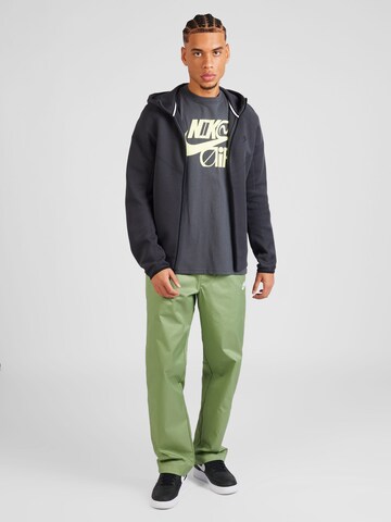 Nike Sportswear Loose fit Trousers 'CLUB' in Green