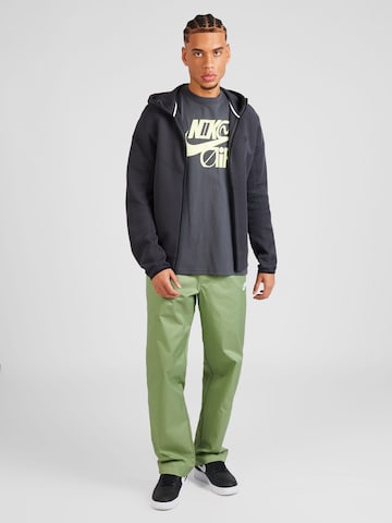 Nike Sportswear Lużny krój Spodnie 'CLUB' w kolorze zielony