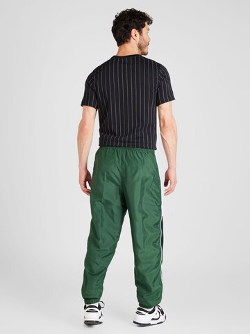 Tapered Pantaloni 'Air' de la Nike Sportswear pe verde