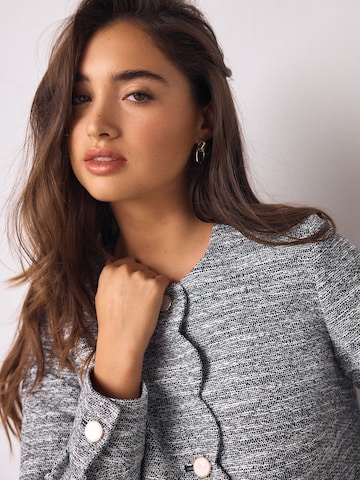 Next Tussenjas in Blauw