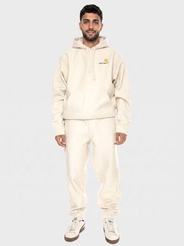 Carhartt WIP Baggy Pants 'American Script Jogging Pant Moonbeam' in Beige