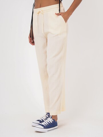 FRESHLIONS Loose fit Trousers 'Mila' in Beige