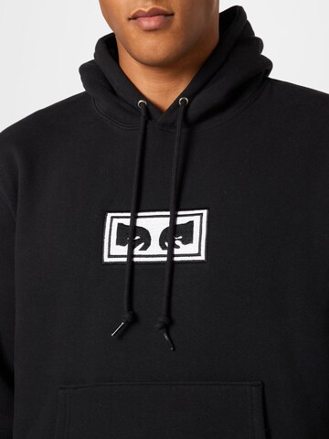 Sweat-shirt Obey en noir