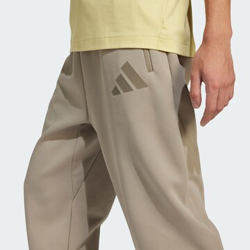 ADIDAS SPORTSWEAR Loosefit Sportovní kalhoty 'Z.N.E.' – béžová