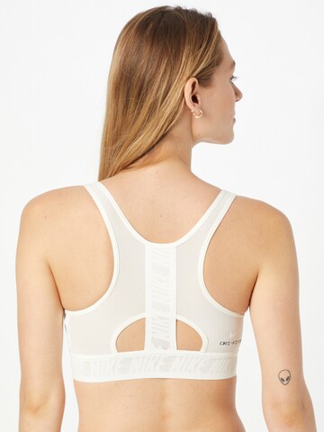 Bustier Soutien-gorge de sport NIKE en blanc