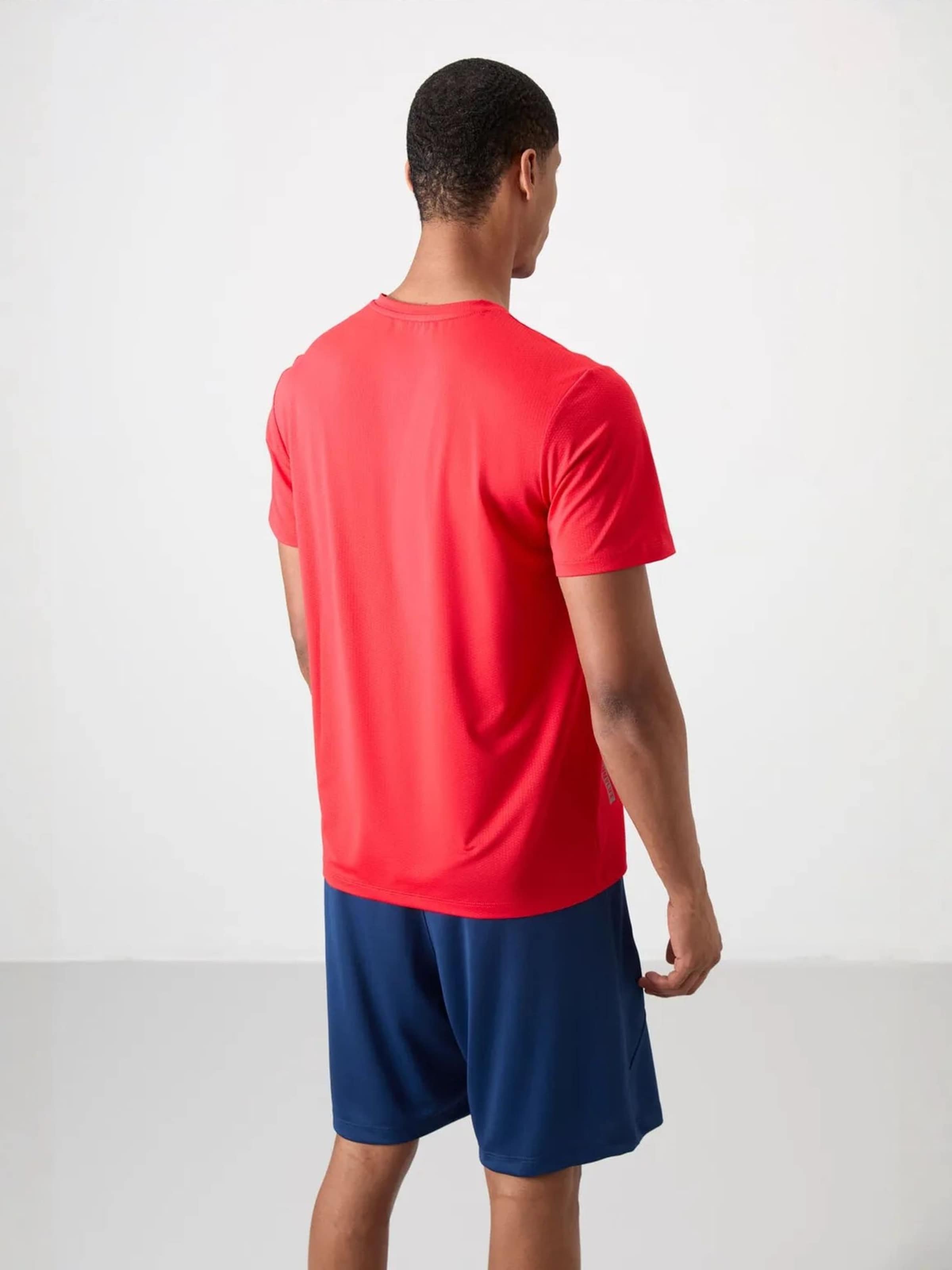 T-Shirt fonctionnel Tommy Life en rouge