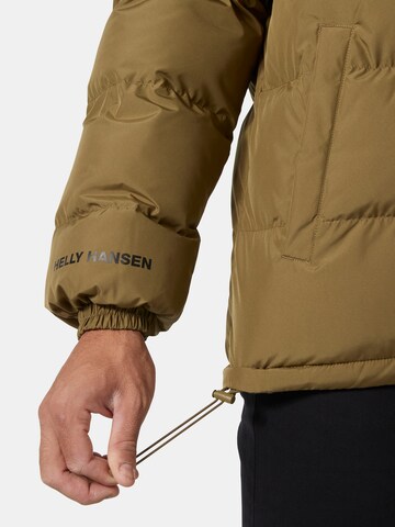 HELLY HANSEN Talvitakki 'YU 23' värissä ruskea
