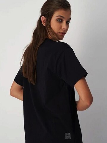 Champion T-Shirt in Schwarz: Vorderseite