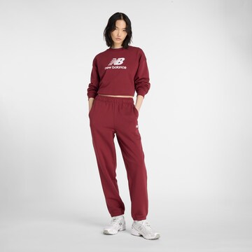 Sweat-shirt 'Essentials' new balance en rouge