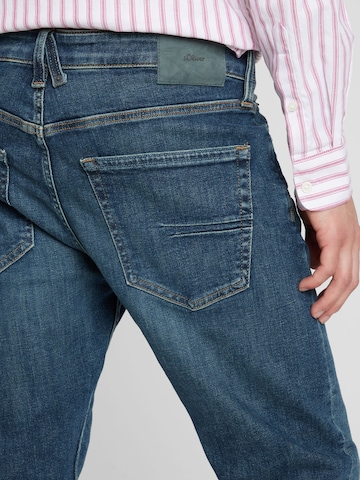 s.Oliver Tapered Jeans in Blau