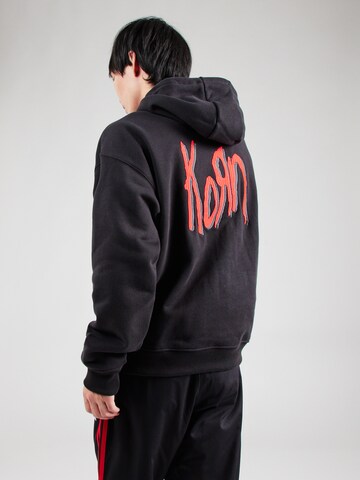 ADIDAS ORIGINALS - Sudadera 'Korn' en negro