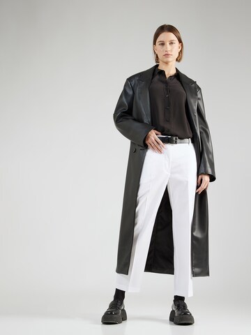regular Pantaloni chino di TOMMY HILFIGER in bianco