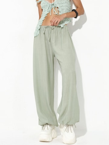 Busem Trousers in Green: front