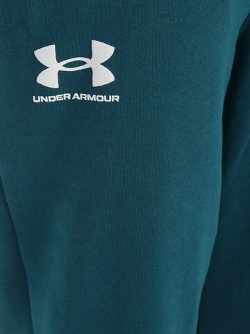 UNDER ARMOUR Tapered Παντελόνι φόρμας 'Rival' σε πράσινο