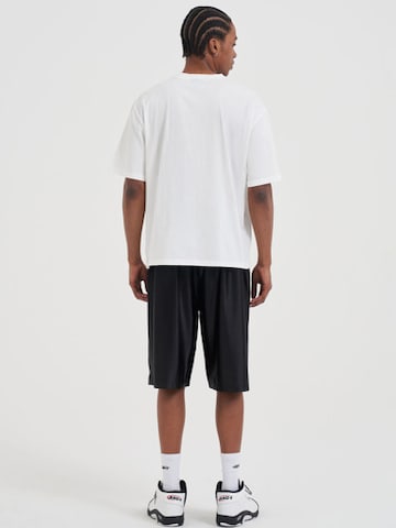 AND1 Paita värissä valkoinen