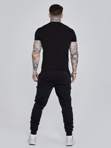 Effilé Pantalon cargo SikSilk en noir