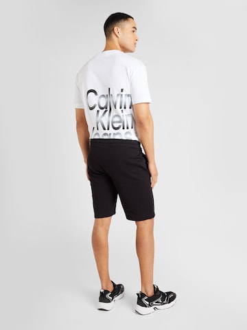 Calvin Klein Szabványos Nadrág 'Degrade' - fekete