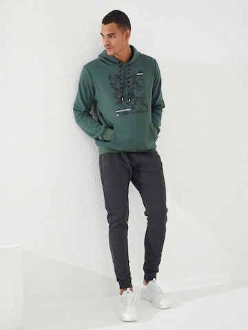 Sweat-shirt Tommy Life en vert
