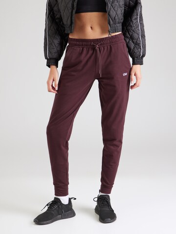 Tapered Pantaloni sportivi 'Activity' di ICANIWILL in rosso: frontale