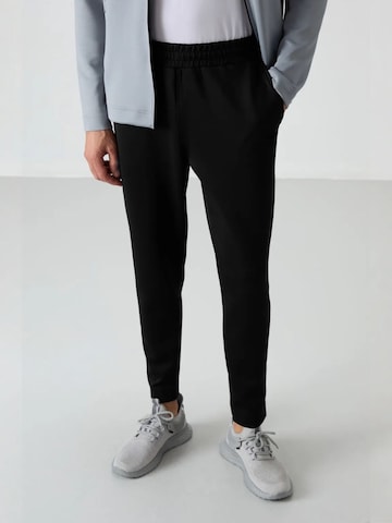 Survêtements Tommy Life en gris