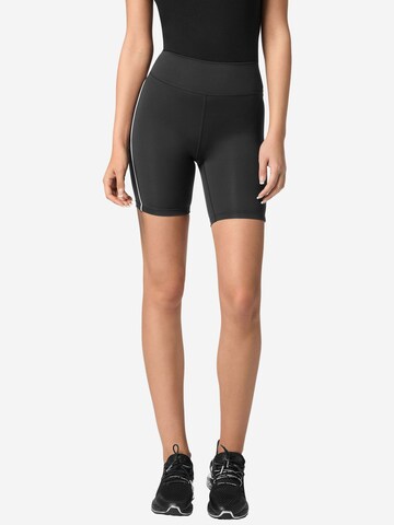 Plein Sport Skinny Sports trousers in Black: front