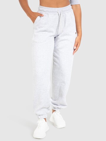 Effilé Pantalon de sport 'Amelia' Smilodox en gris : devant