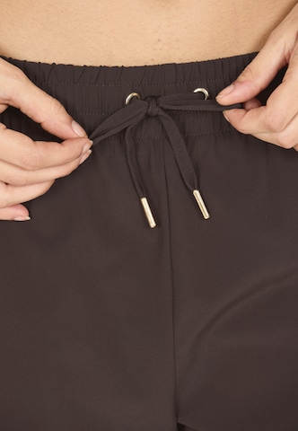 Athlecia Regular Shorts 'Timmie' in Braun