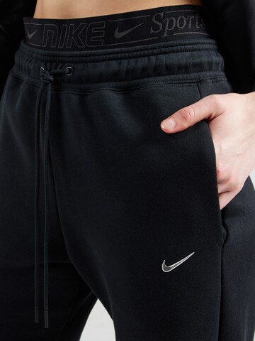 Wide leg Pantaloni 'PHNX FLC' di Nike Sportswear in nero