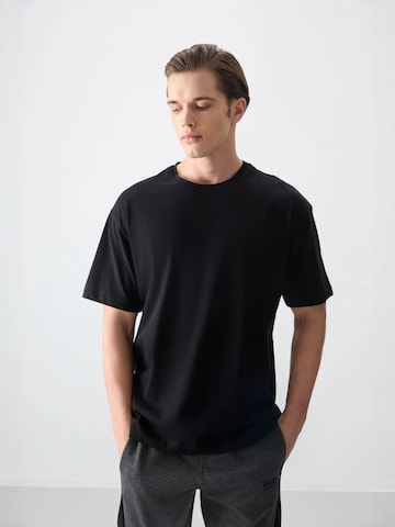 Tommy Life T-Shirts in Schwarz