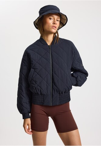 Veste mi-saison 'Lyon' rethinkit studios en bleu : devant