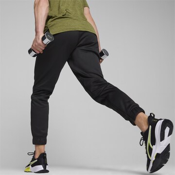 PUMA Tapered Sportbroek in Zwart