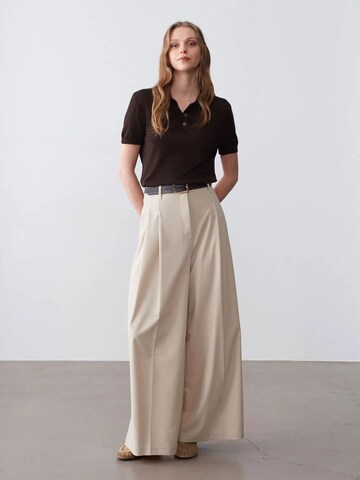 Wide leg Pantaloni di Dilvin in beige: frontale
