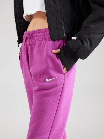 Nike Sportswear Tapered Παντελόνι φόρμας 'Phoenix Fleece' σε ροζ