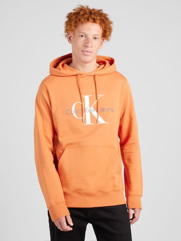 Calvin Klein Jeans - Sudadera 'Essentials' en naranja: frente