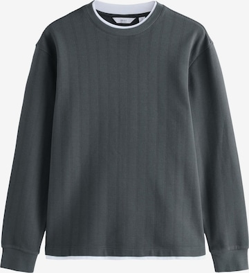 Tricou de la Next pe albastru: față