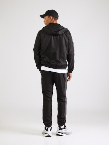 EA7 Emporio Armani Treenipuku värissä musta