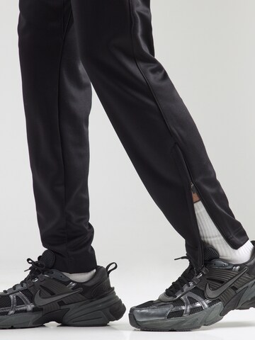 BJÖRN BORG Tapered Sportbroek 'ESSENTIAL' in Zwart