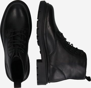 LEVI'S ® - Botines con cordones en negro