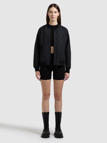 khujo - Chaqueta de entretiempo 'Rylee' en negro