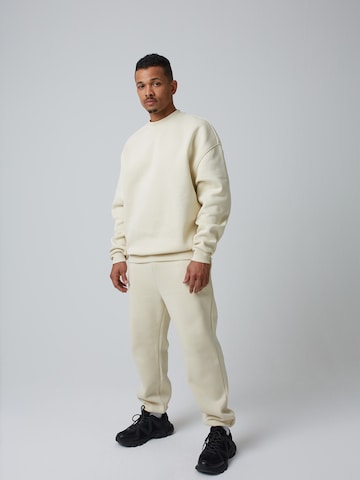 ABOUT YOU x Benny Cristo Regular Pants 'Keno' in Beige