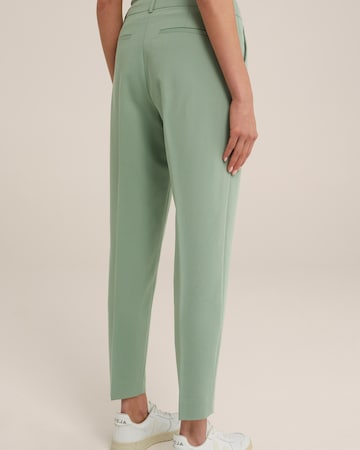 WE Fashion Slimfit Spodnie w kant w kolorze zielony