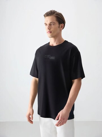 Tommy Life T-Shirts in Schwarz