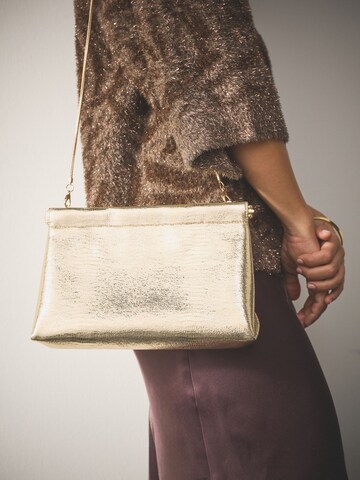 Clutch de la Next pe auriu