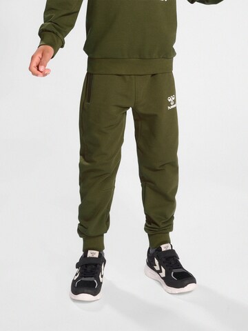 Hummel Regular Workout Pants 'ON' in Green: front