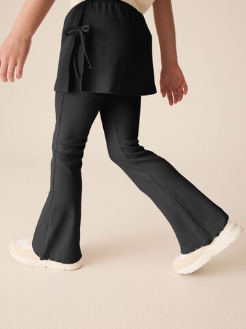 Flared Pantaloni di Next in nero