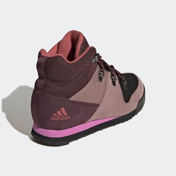 Boots 'Climawarm Snowpitch' di ADIDAS TERREX in rosso