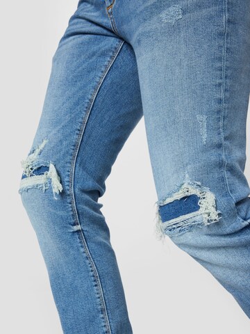 River Island - Skinny Vaquero 'ELLIOT' en azul