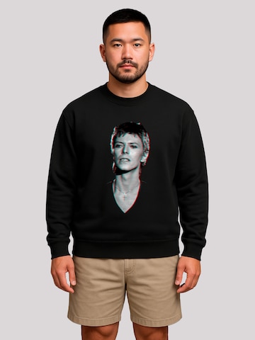 F4NT4STIC Sweatshirt 'TV Times Pop Star David Bowie Portrait 1977' in Zwart