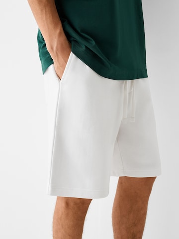 Bershka Loose fit Trousers in White