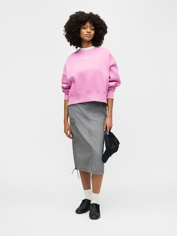 Nike Sportswear Bluzka sportowa 'Phoenix Fleece' w kolorze różowy